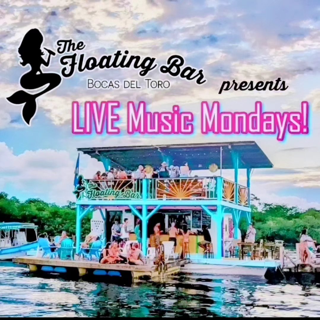 Guests filling both decks at the flagship Floating Bar for Live Music Mondays, seen from the water